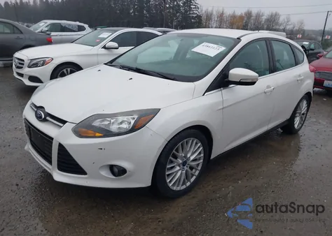 2014 Ford Focus Titanium from USA, damaged, VIN 1FADP3N25EL375578